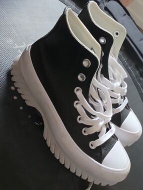 Converse Women’s Black High-Top Sneakers with White Lug Sole